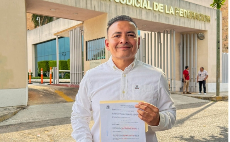 Gana juicio por difamación